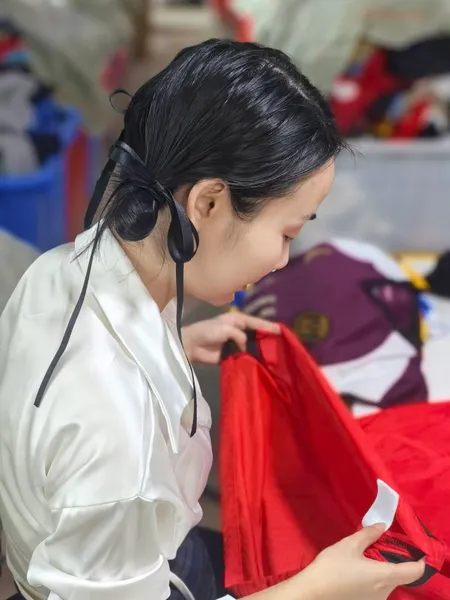 RealismThrift Quality Control - Inspecting Used Clothing